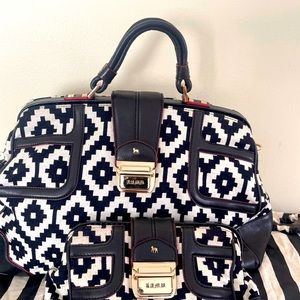 L.A.M.B. Carpet handbag and clutch set by Gwen Stefani